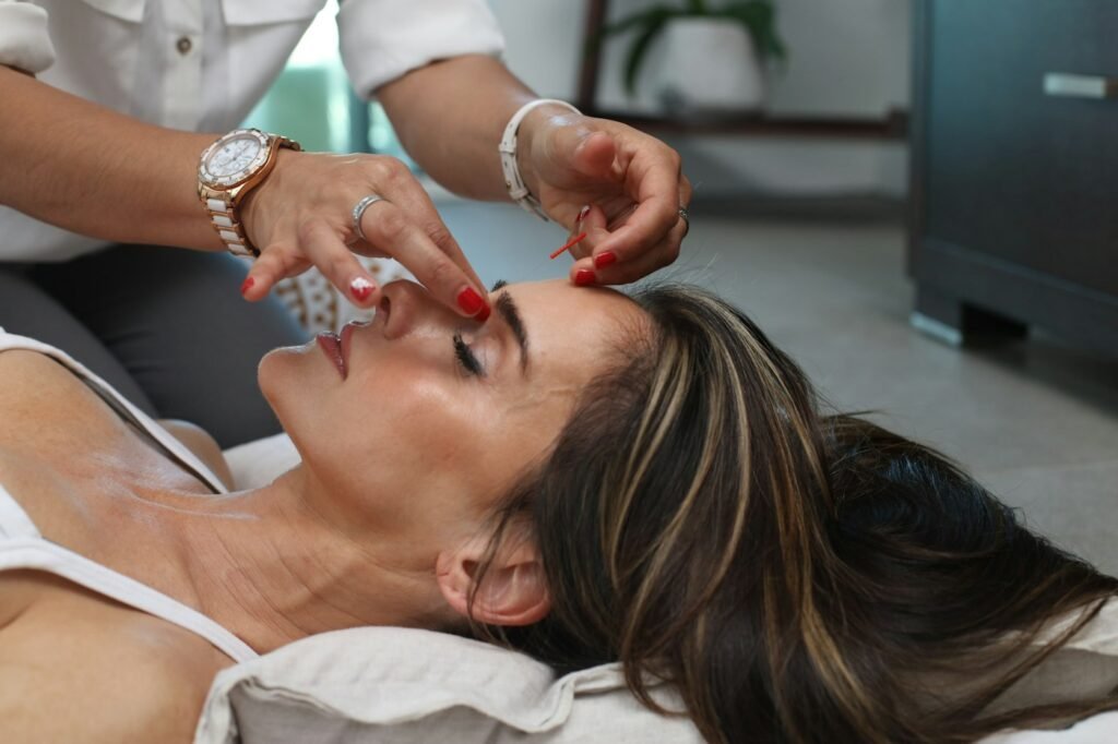 Patient relaxed in a dental chair during a checkup at the JLT clinic